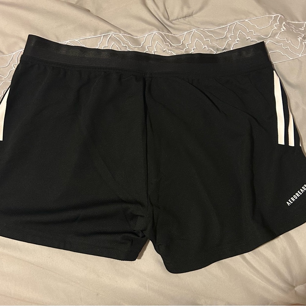 Adidas black shorts.